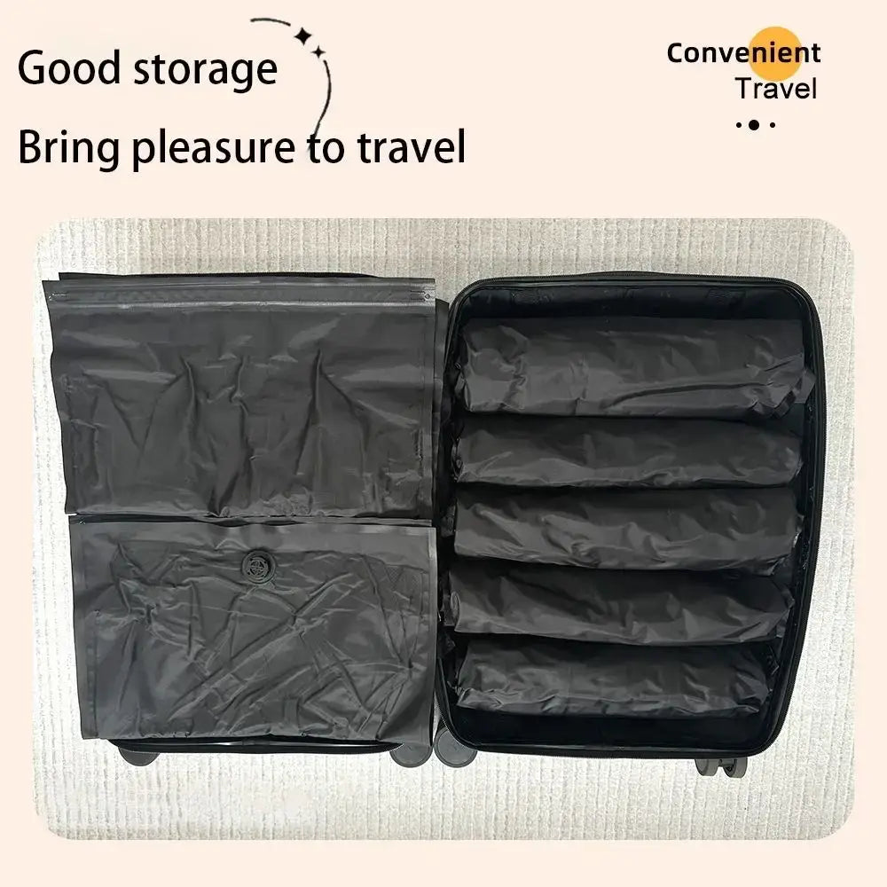 Black fabric vacuum storage bag with multiple compartments for efficient travel storage and roll vacuum bags use