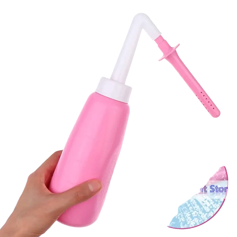 Pink plastic vaginal anal wash bottle with white cap and pink perforated nozzle made of eva soft plastic