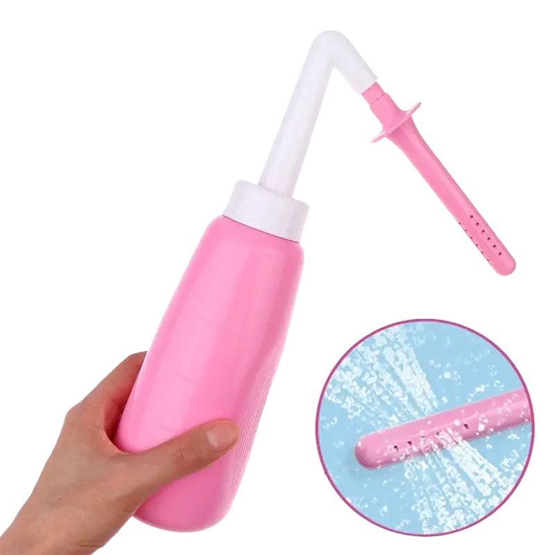 Pink plastic vaginal anal wash bottle with white cap and perforated nozzle made of eva soft plastic