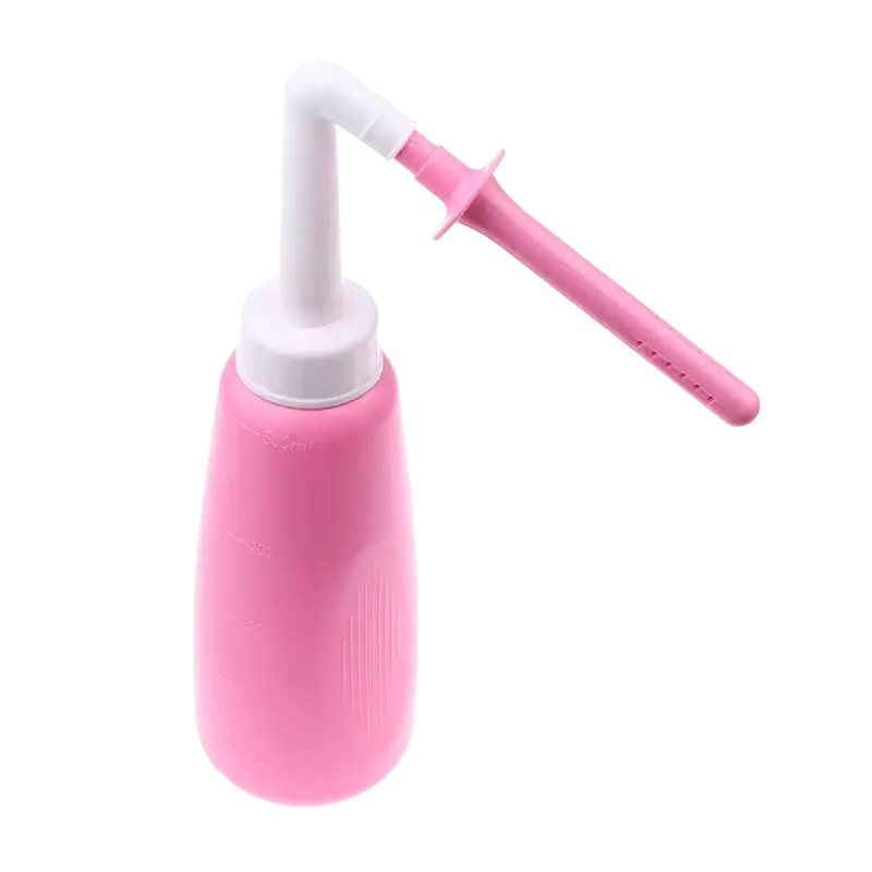 Pink vaginal anal wash bottle made of eva soft plastic with white cap and pink nozzle attachment