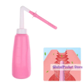 Pink vaginal anal wash bottle made of eva soft plastic with white nozzle and pink tip for effective cleaning