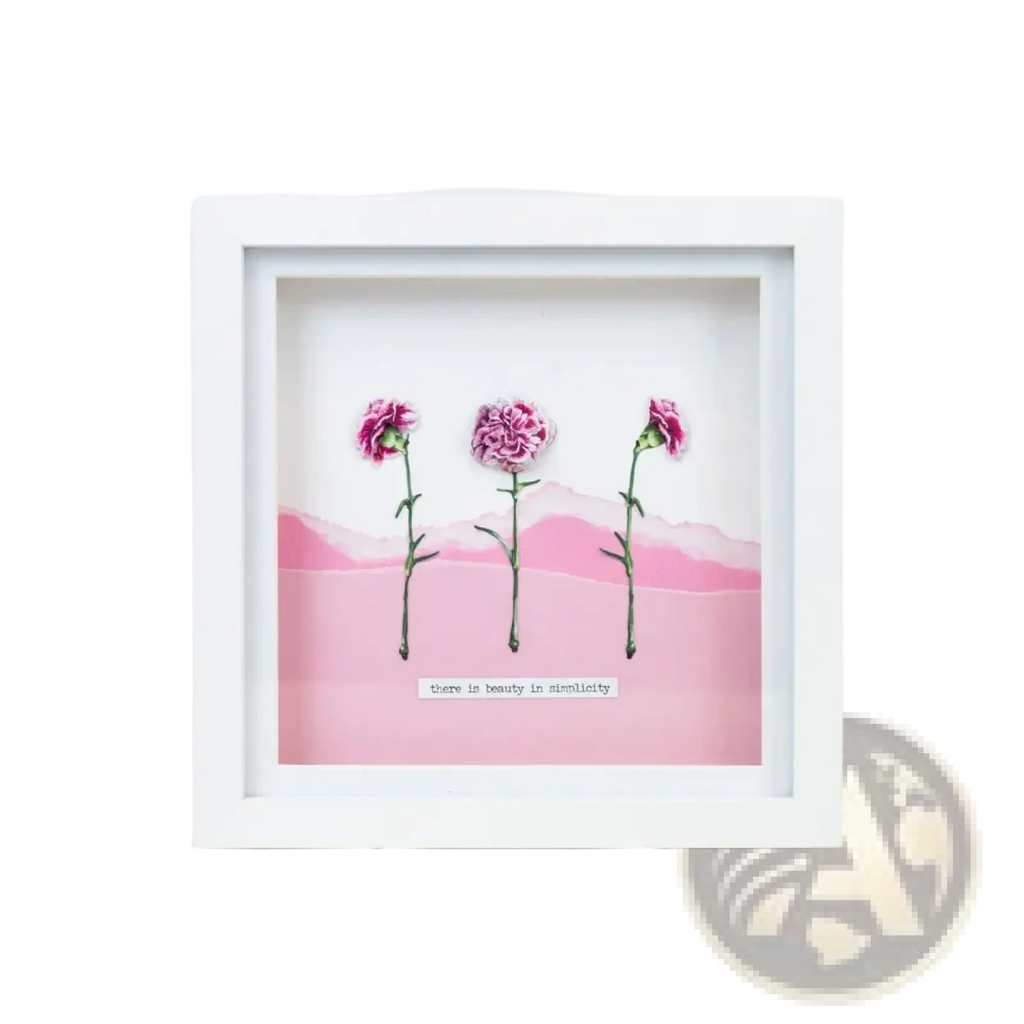 Valentine metal cutting die featuring white-framed art of pink carnations with green stems and a layered pink backdrop