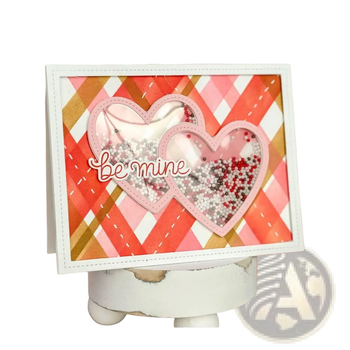 Valentine metal cutting dies and clear stamps set featuring a pink and white heart-shaped shaker card with red beads