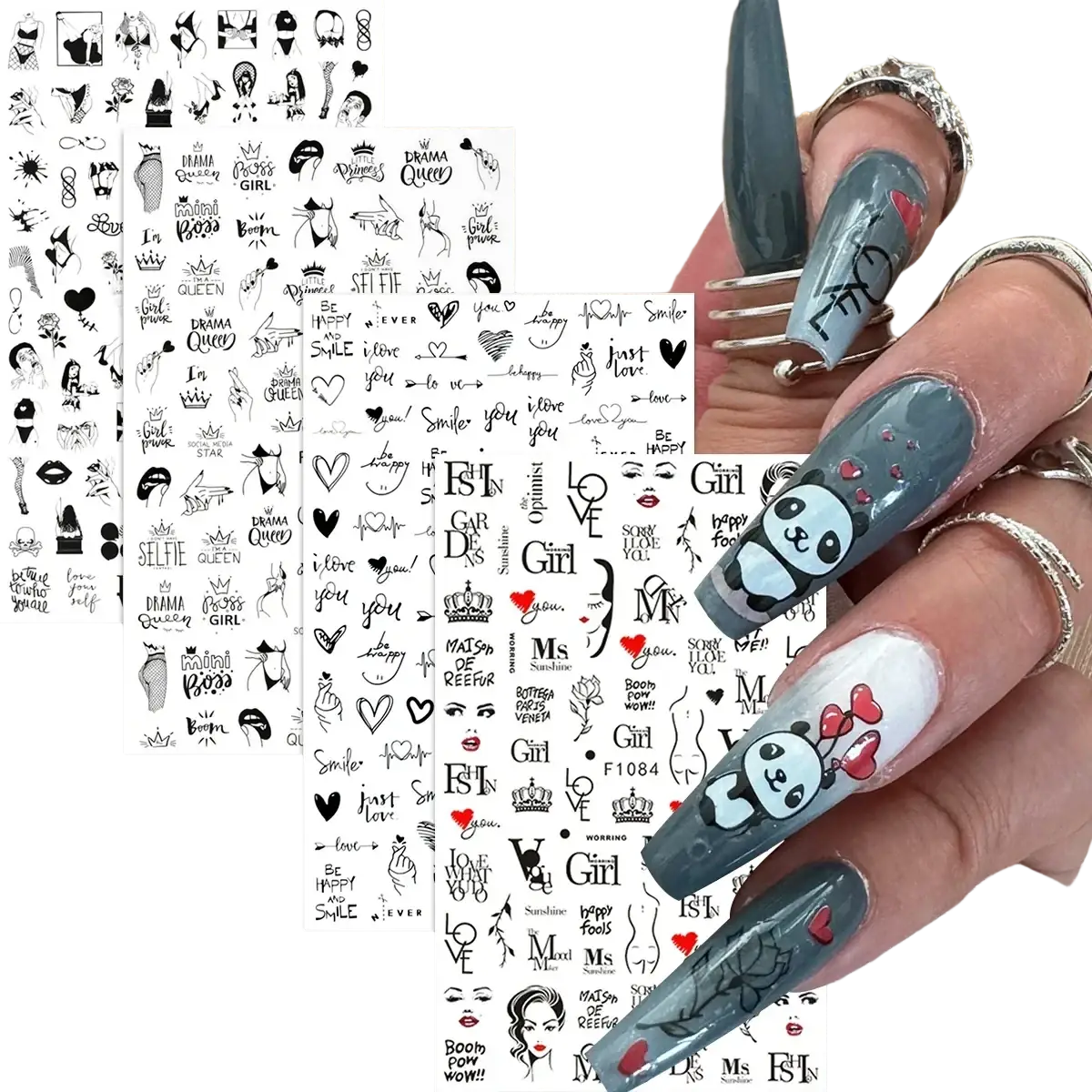 A hand with long dark gray and white nails featuring valentine nail stickers with panda decals and red heart designs