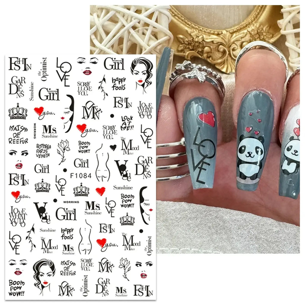 A sheet of black and red Valentine nail stickers featuring love heart floral diy art decals with faces and crowns