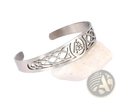 Silver-toned stainless steel cuff bracelet with intricate celtic knotwork and central valknut triangular symbol