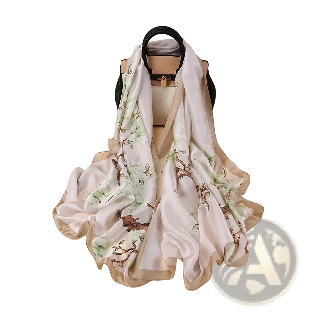 A cream silk van Gogh almond blossom scarf with green leaves and brown branches draped over a beige handbag