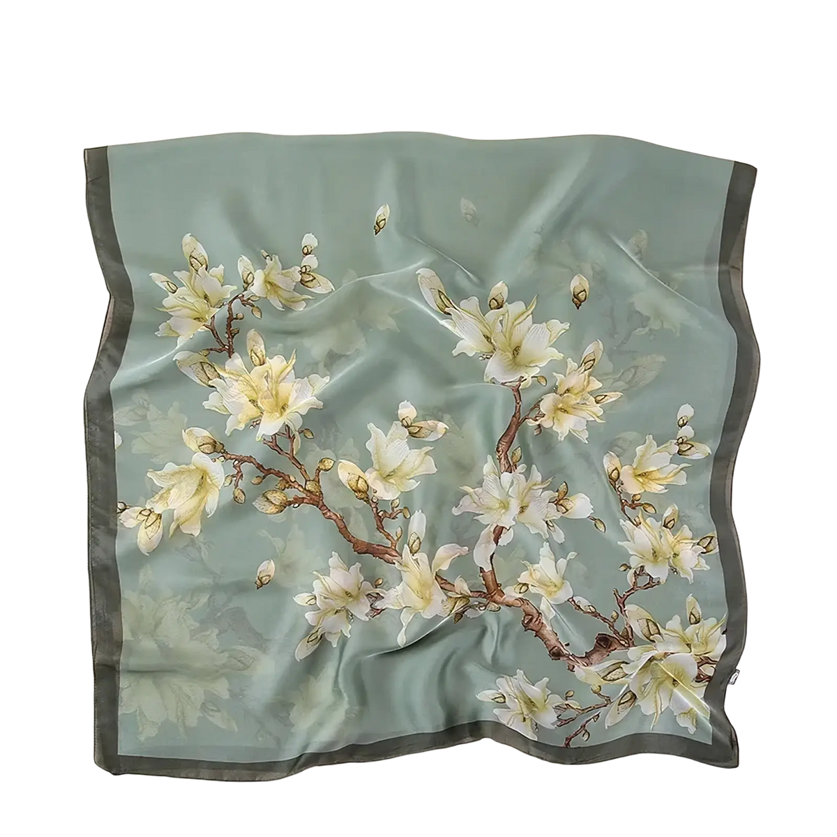 A delicate mint green silk Van Gogh Almond Blossom scarf with white floral pattern and dark gray border