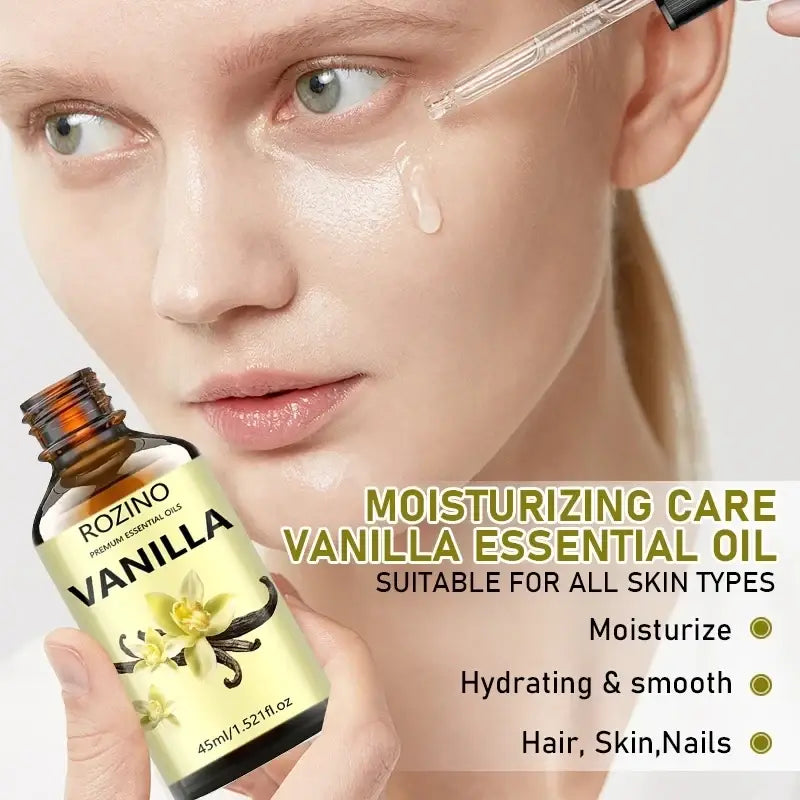 A bottle of Rozino vanilla essential oil in dark amber glass for skin care and massage with vanilla flower label