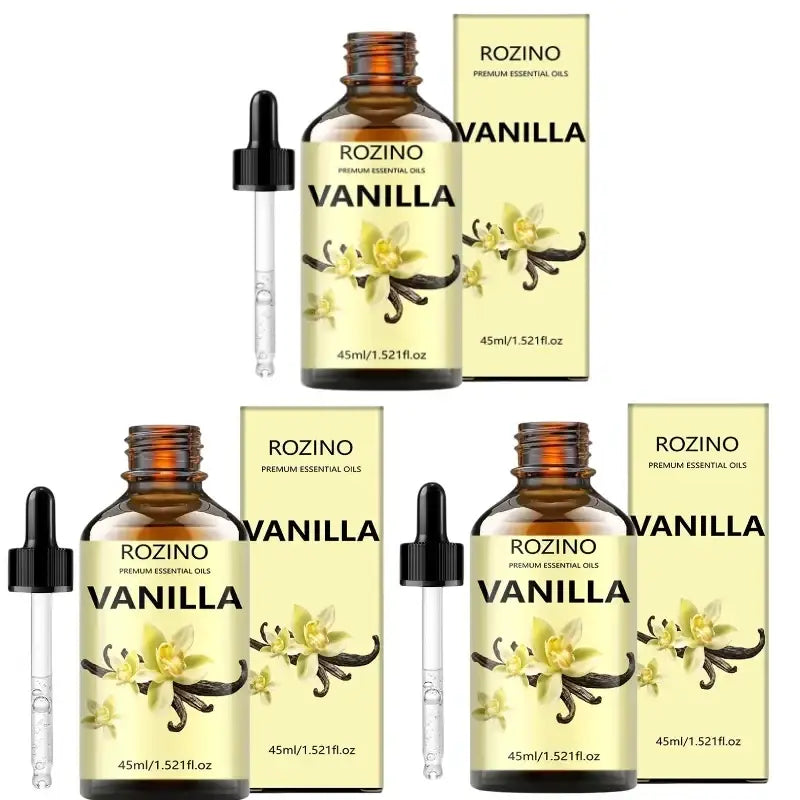 Three amber glass bottles of rozino vanilla essential oil with black dropper caps for skin care and massage use
