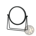 Black round vanity mirror with minimalist metal frame and stand designed for makeup and desk use