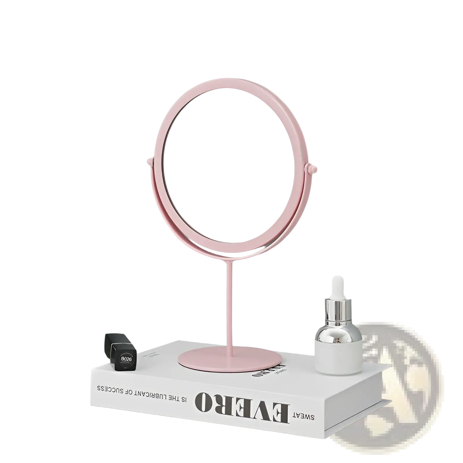 A delicate pink round vanity mirror with a smooth metal frame and slender stand for makeup desk use