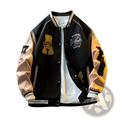Black and tan varsity leather sleeve coat with embroidered patches button closures and ribbed cuffs in slim fit