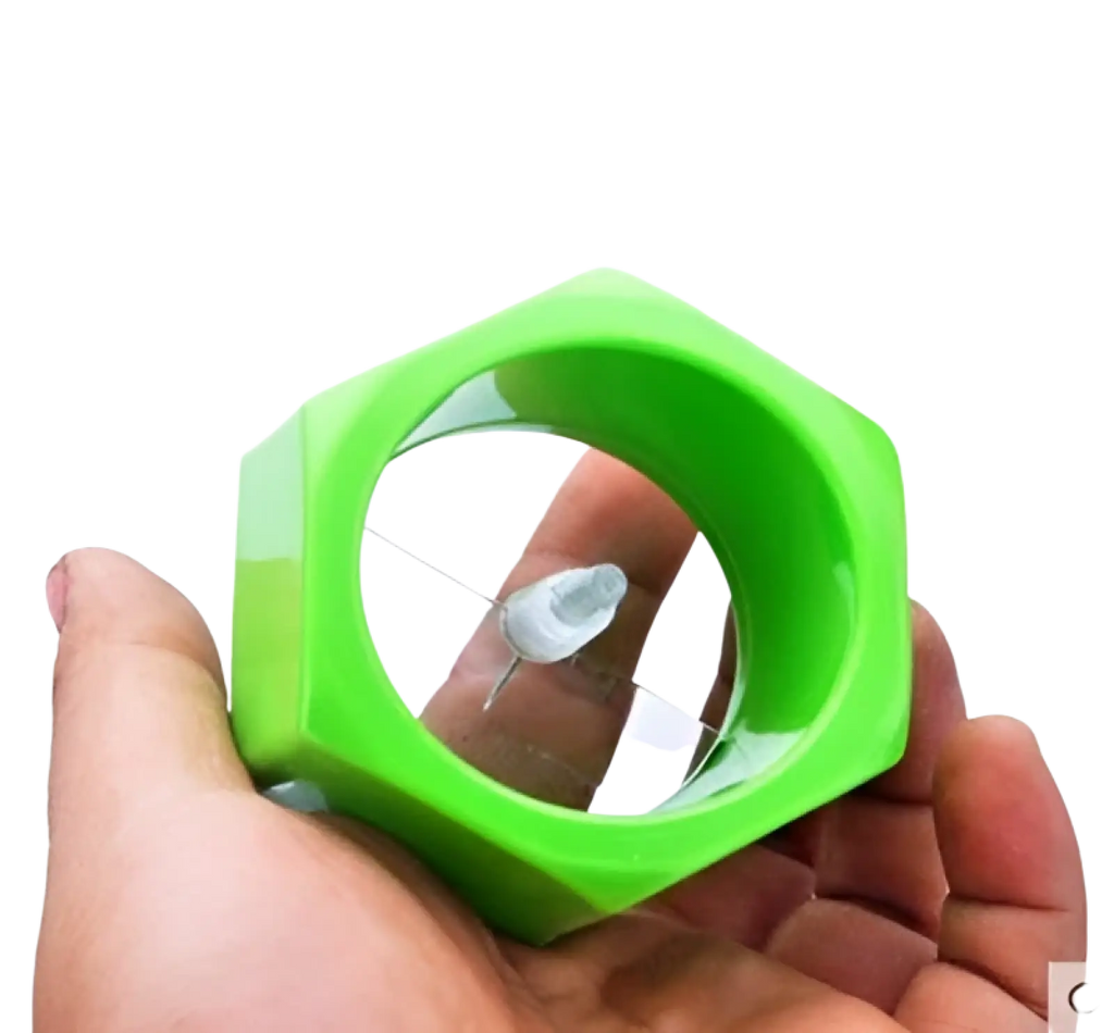 Bright green hexagonal plastic vegetable spiralizer with clear circular cutting window for manual cucumber slicing