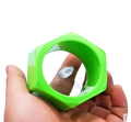 Bright green hexagonal plastic vegetable spiralizer with clear circular cutting window for manual cucumber slicing