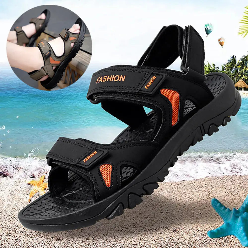 Men’s breathable athletic velcro beach sandals in black and orange with mesh accents and adjustable straps
