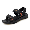 Men’s breathable athletic velcro beach sandals in black and orange with mesh accents and a textured rubber sole