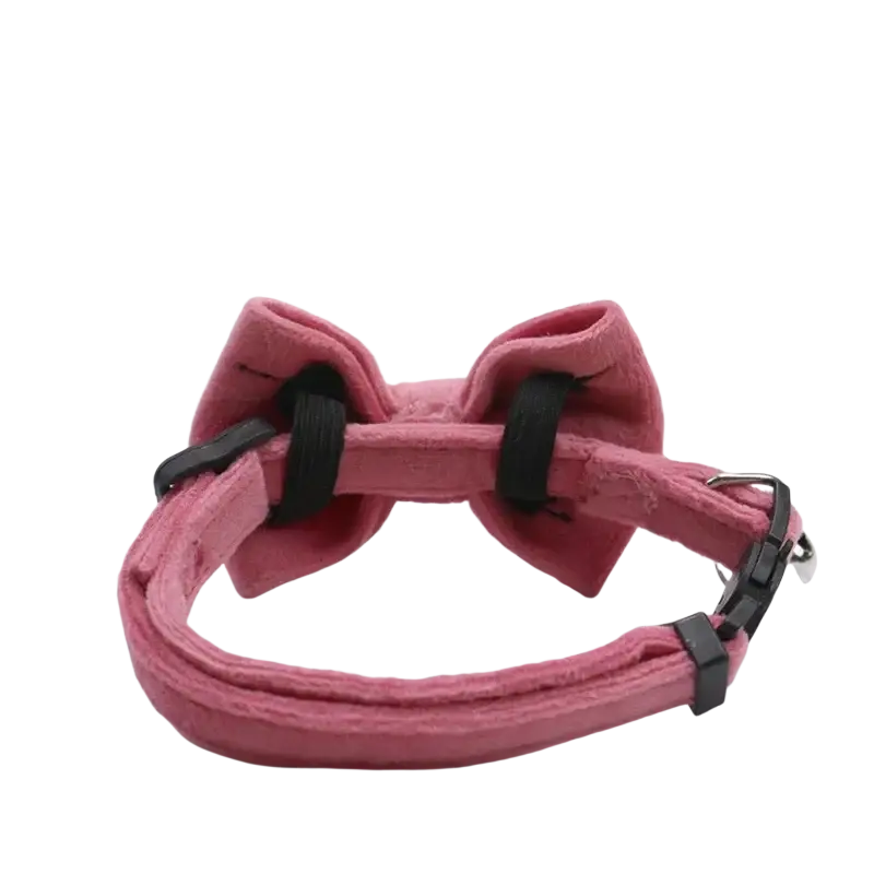 Pink suede velvet bow cat collar with bell featuring black plastic buckle and metal clasp shown from back side