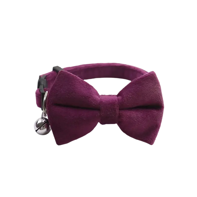 A plush burgundy velvet bow tie cat collar with a silver bell charm from the velvet bow cat collar with bell 3 pack