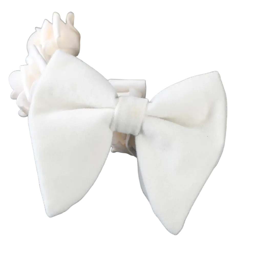 A plush white velvet bow tie with a soft texture and neatly tied center knot for formal neckwear gifts
