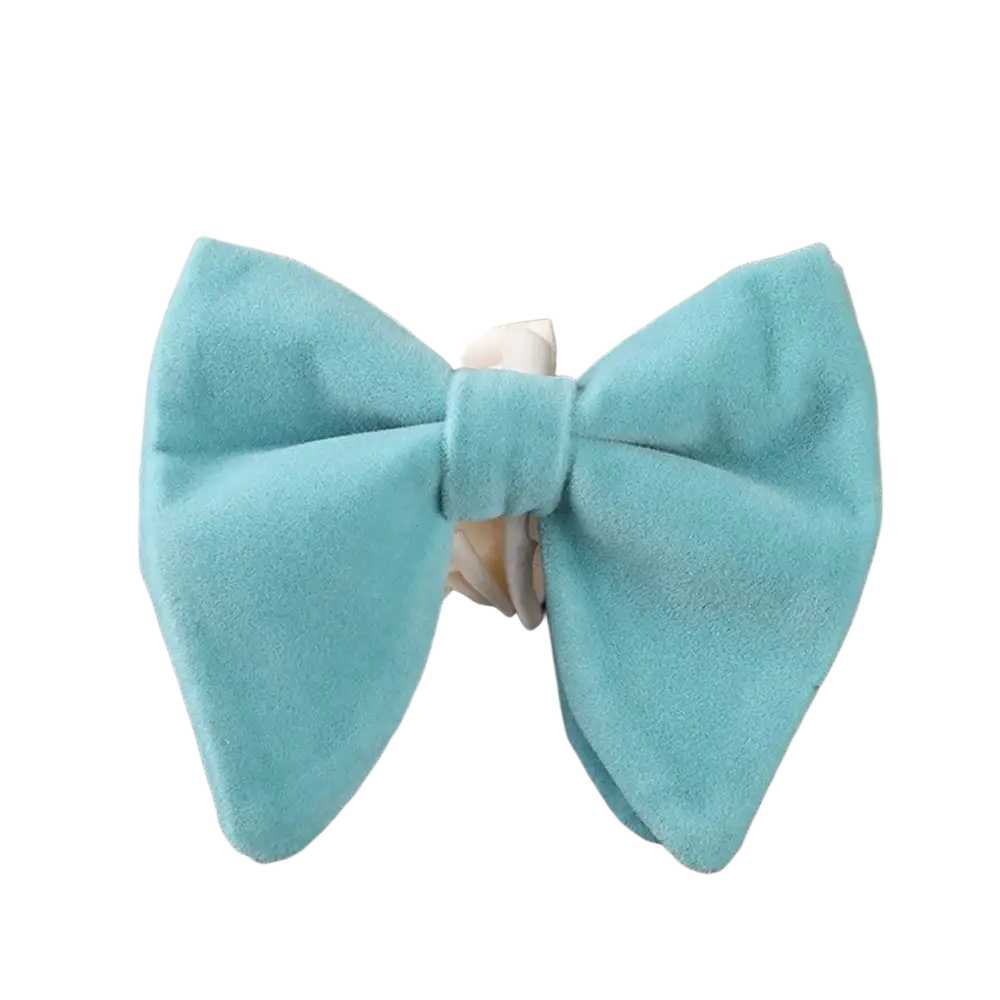 A soft light blue velvet bow tie with a classic symmetrical design for formal neckwear and gifting