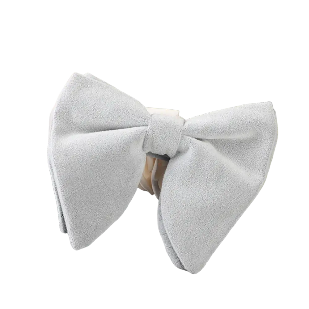 A soft light gray velvet bow tie with a classic symmetrical design ideal for formal neckwear and gifts