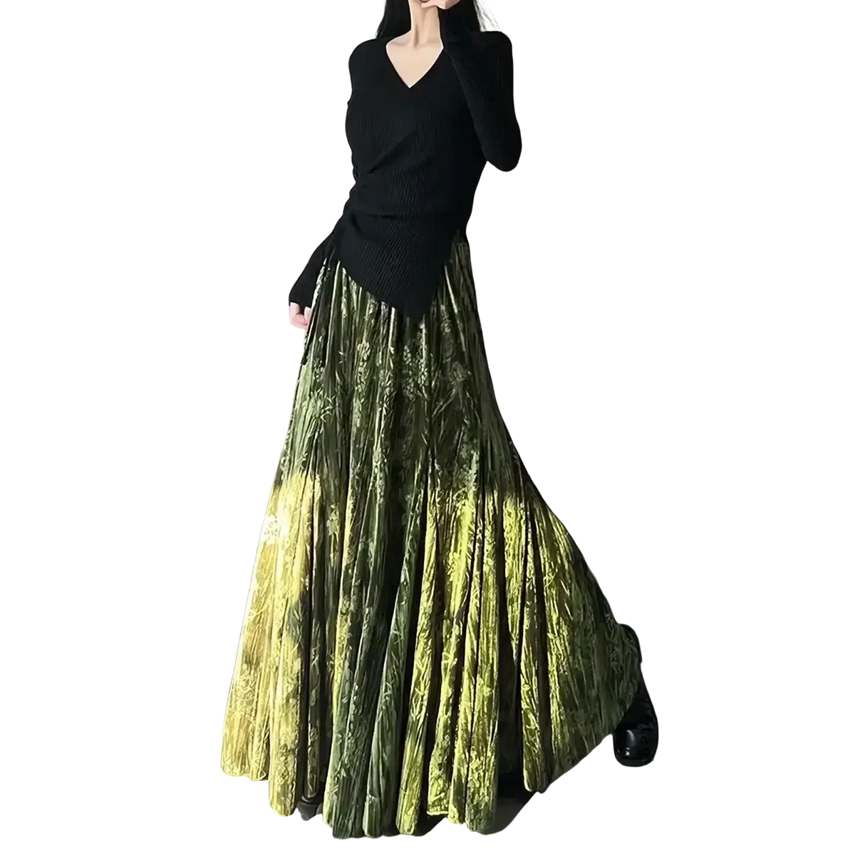 A flowing gradient green velvet high waist midi skirt with subtle leaf pattern and pleated a-line design