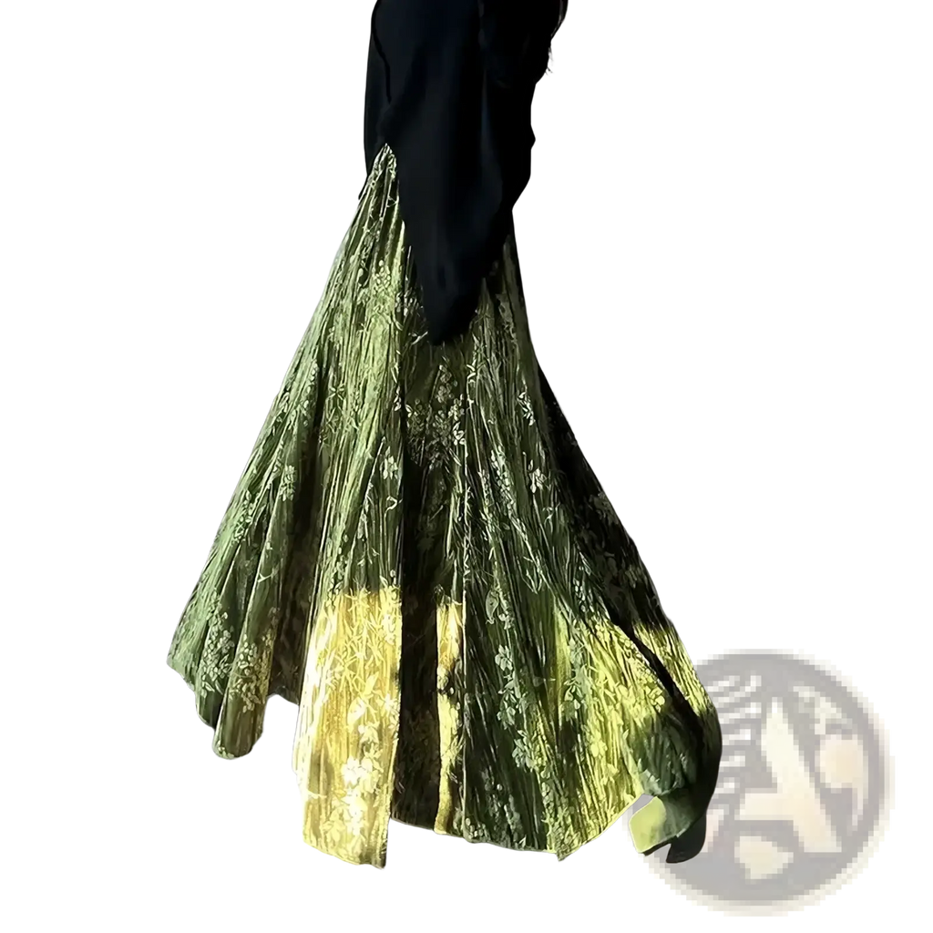 Velvet high waist pleated a-line midi skirt in olive green velvet with subtle floral pattern and yellow gradient hem