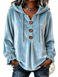 Light blue velvet hoodie with wooden buttons and ruffled cuffs showcasing elegant texture and unique detailing