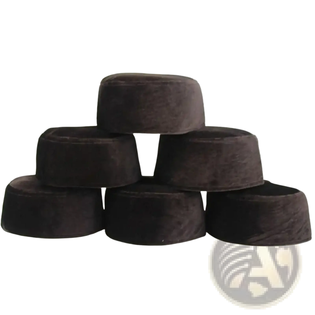 Stack of dark brown velvet cylindrical Muslim prayer hats winter warm Islamic caps for cold weather use