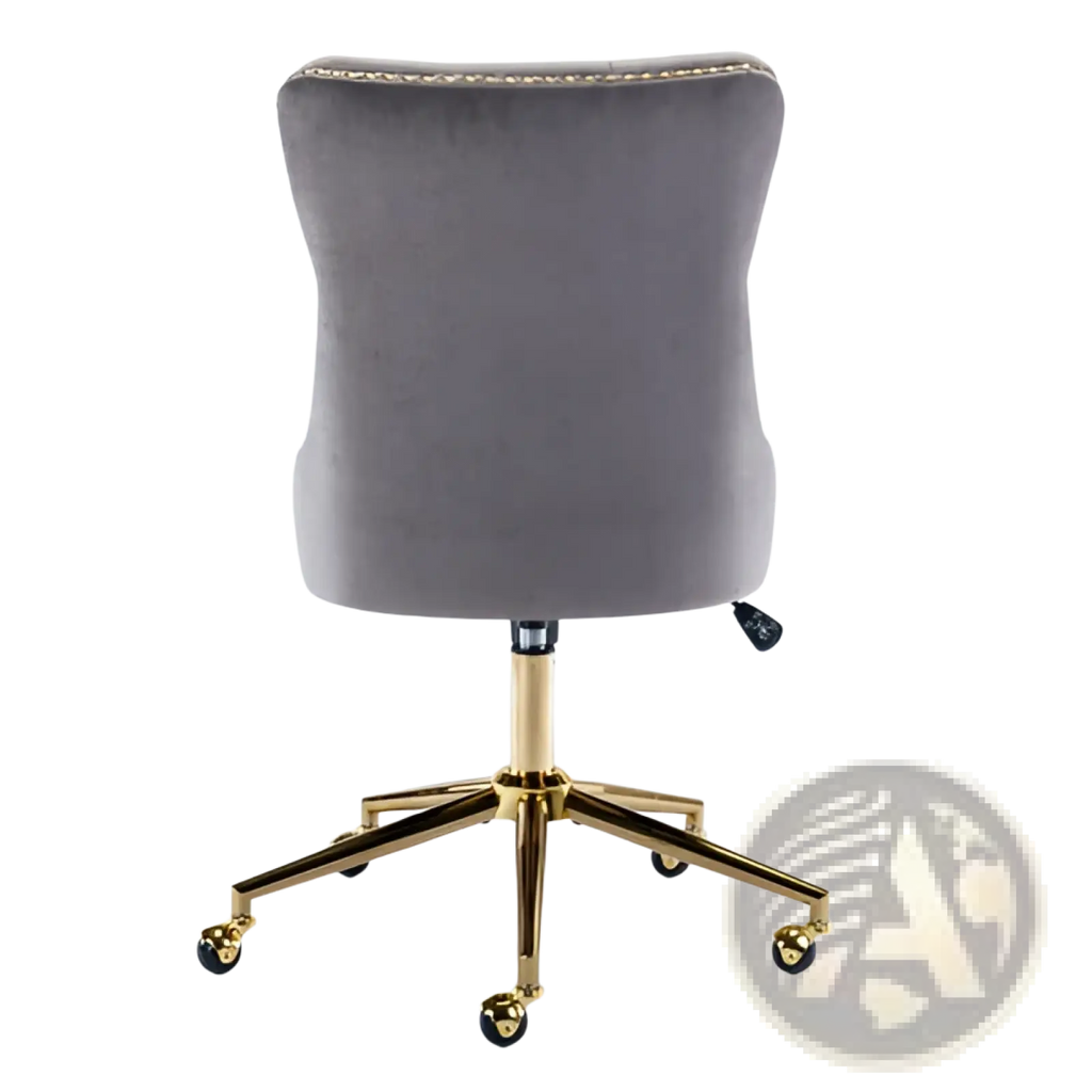 Gray velvet tufted office chair with gold-tone metal base and casters for swivel seating in office spaces