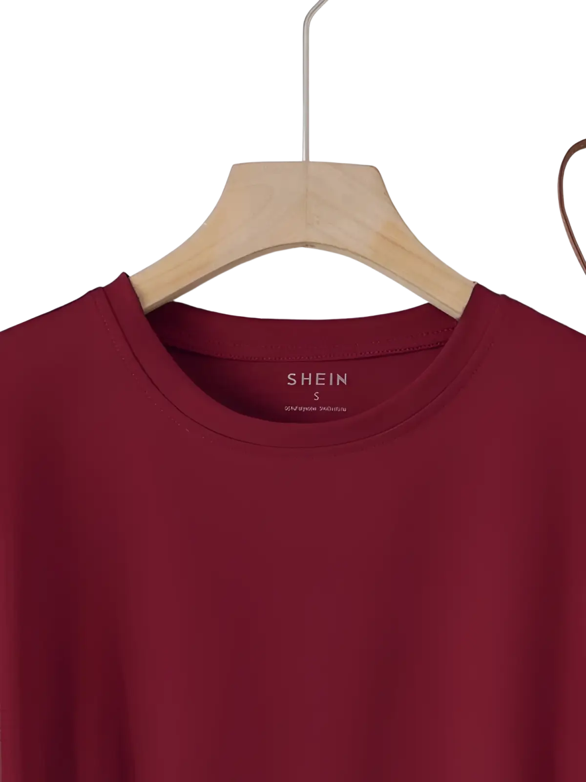 A maroon velvet short sleeve casual tee made of soft cotton fabric with round neck and Shein brand label visible