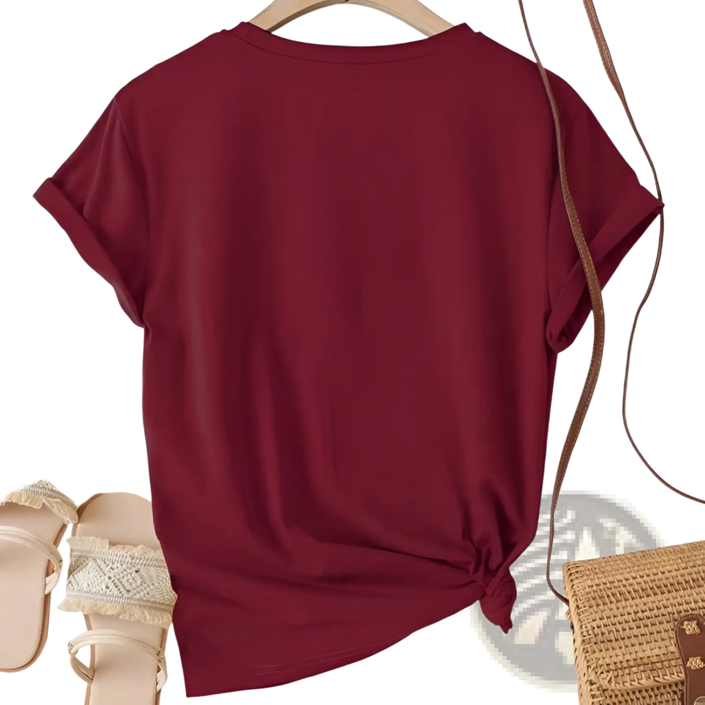 A soft maroon cotton velvet short sleeve casual tee with a round neckline and rolled-up sleeves