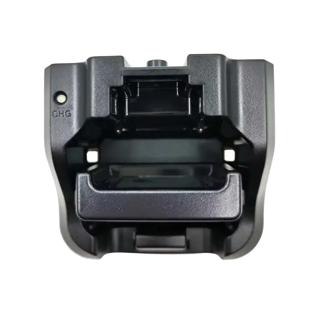 Black plastic vhf marine radio charger with molded grips and integrated indicator light for recent rs-38m model