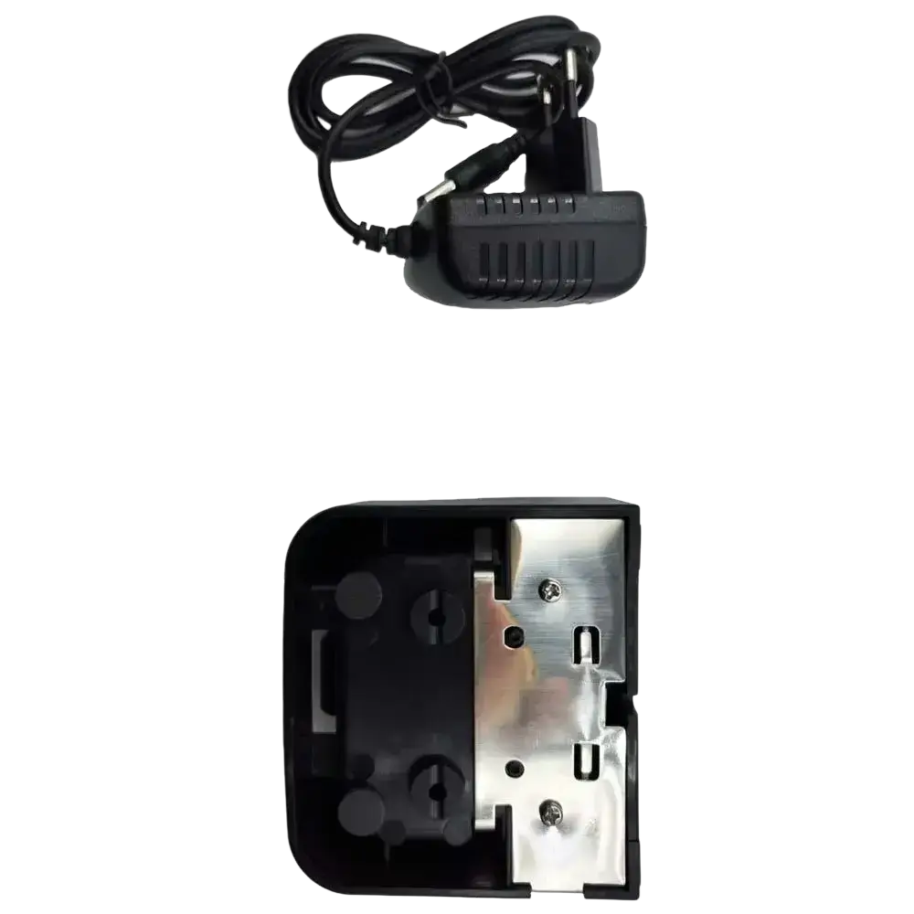 Black plastic vhf marine radio charger with coiled cable and metallic internal components for recent rs-38m models