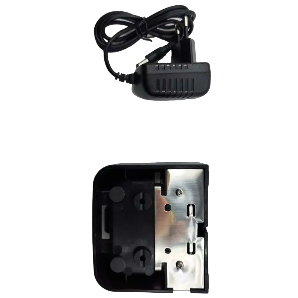 Black plastic vhf marine radio charger with coiled cable and metal connector next to matching black housing with silver plate