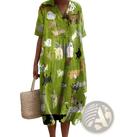 Vibrant lime green short sleeve dress with playful cartoon dog print featuring a relaxed fit and comfortable fabric