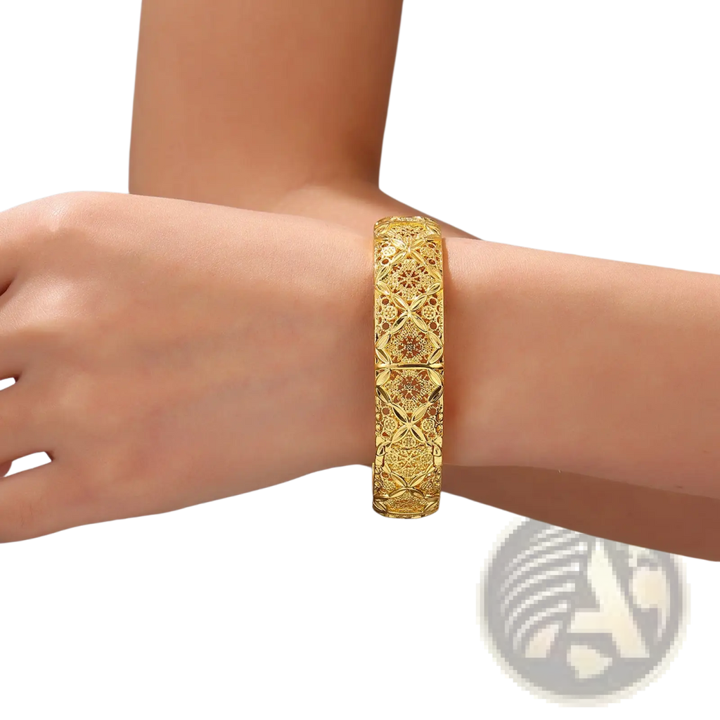 Vintage 18k gold plated bangle bracelet with an intricate geometric lattice design and polished finish