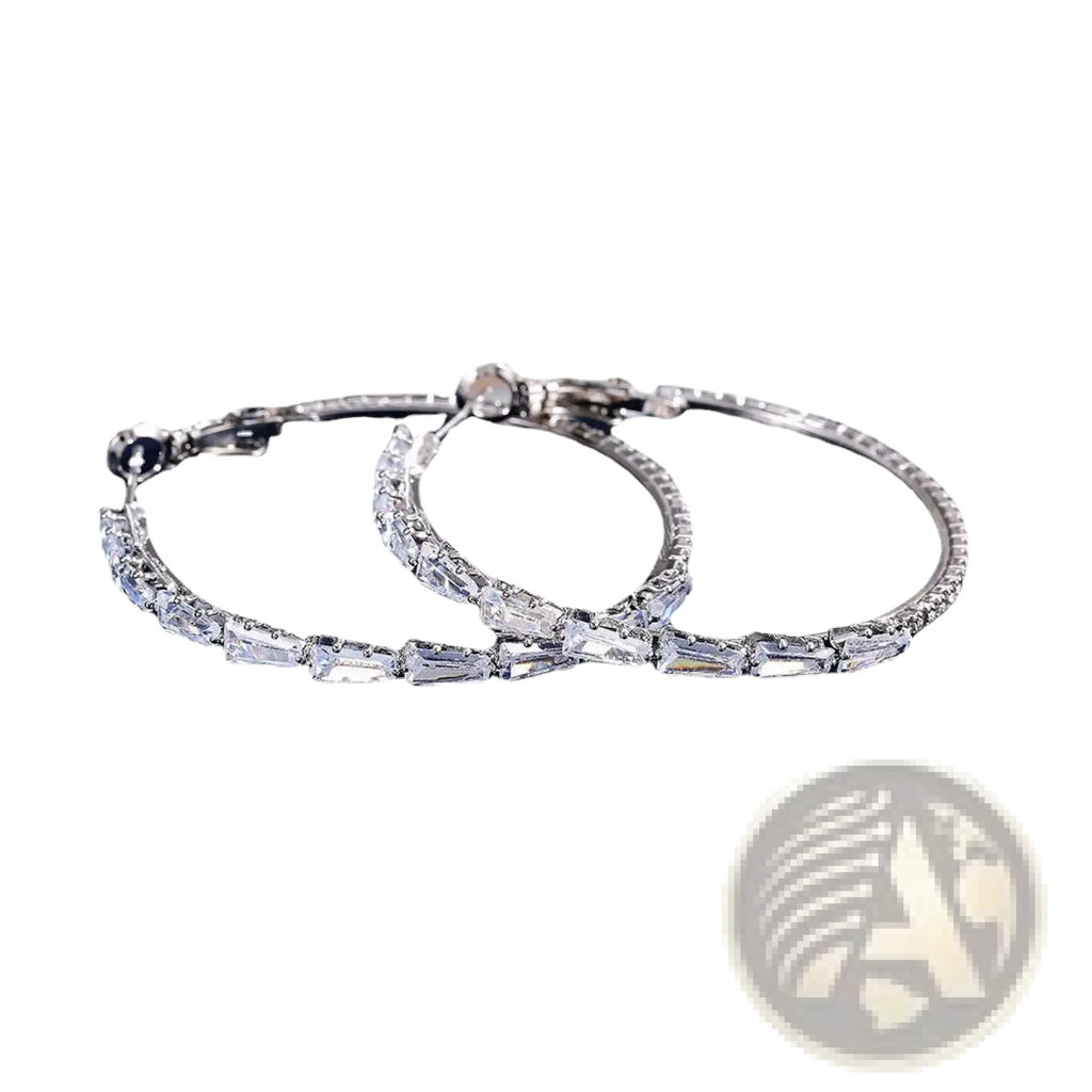 Silver hoop earrings featuring clear rectangular-cut zircon crystals along the band in a vintage style