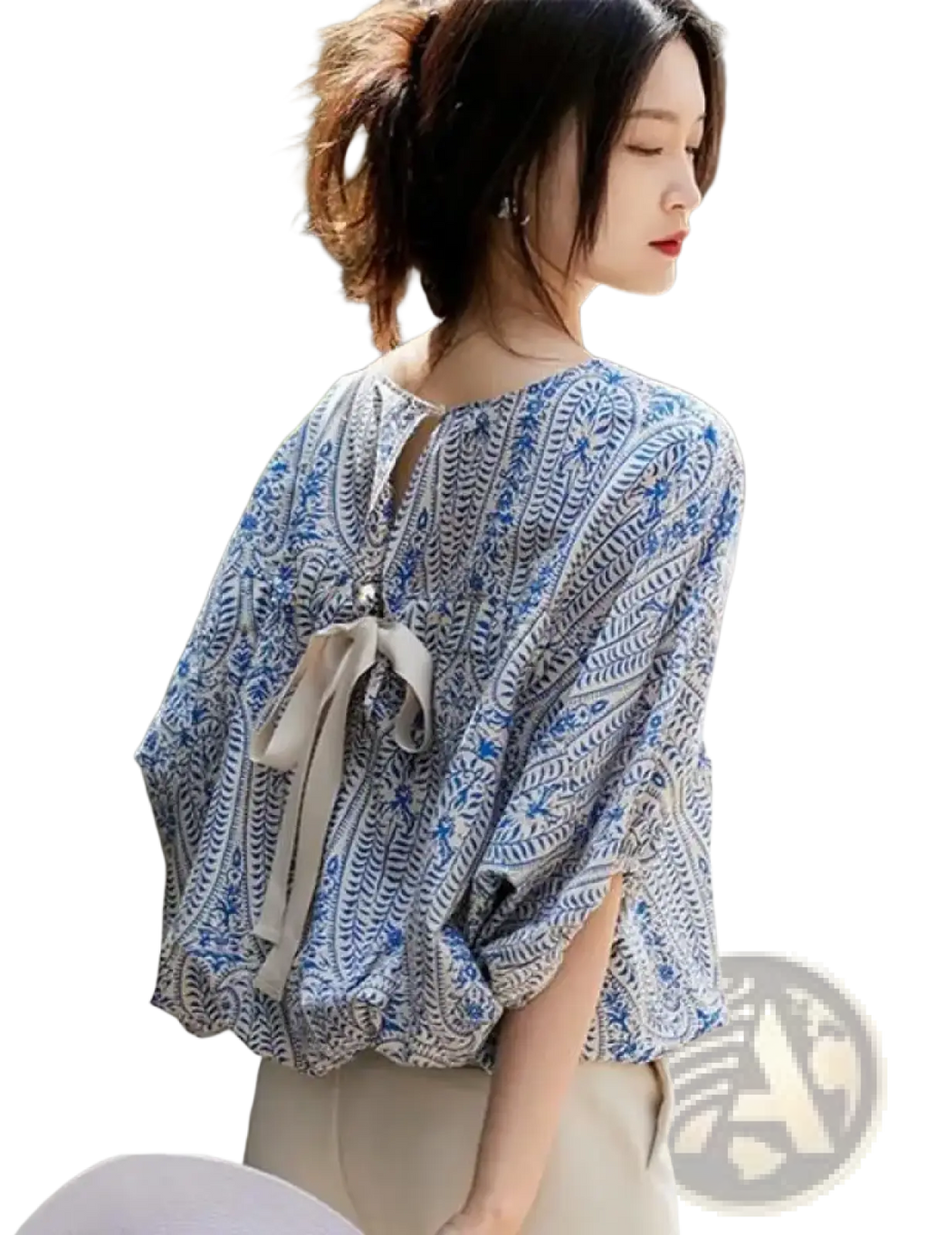 Vintage bow batwing chiffon blouse back view featuring flowing blue and white pattern with tied bow detail