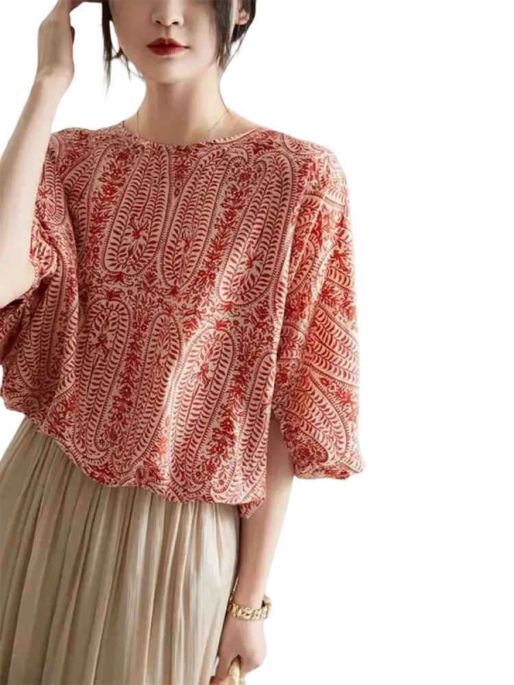 A soft flowing red and cream patterned vintage bow batwing chiffon blouse with intricate embroidered detailing