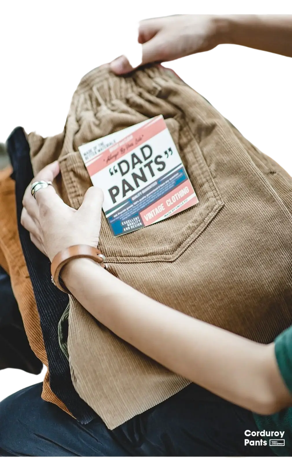 Vintage brown corduroy cargo pants featuring a dad pants label on the front pocket in a casual style
