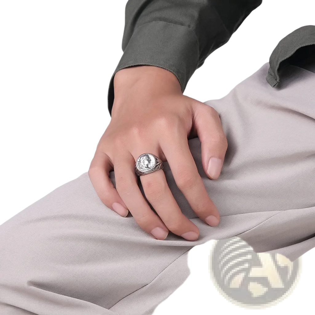 Silver-toned vintage caesar portrait stainless steel signet ring with engraved circular face and ornate textured band