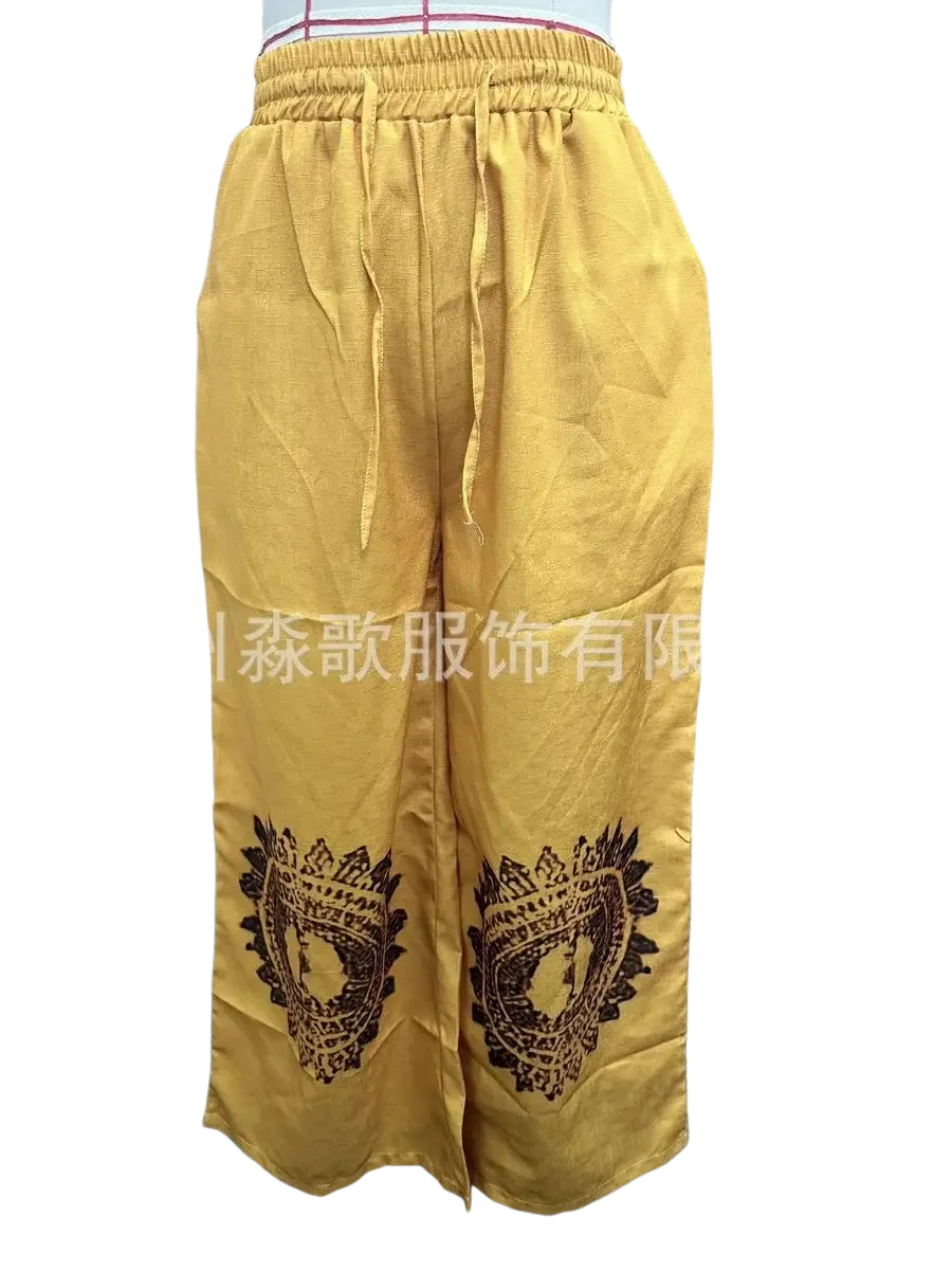 Vintage casual wide yellow wide leg pants with black tribal embroidery and elastic waistband drawstrings in casual pants style
