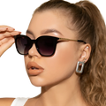 Vintage cat eye sunglasses with black frames, gradient dark lenses, and gold-tone beaded temple arms
