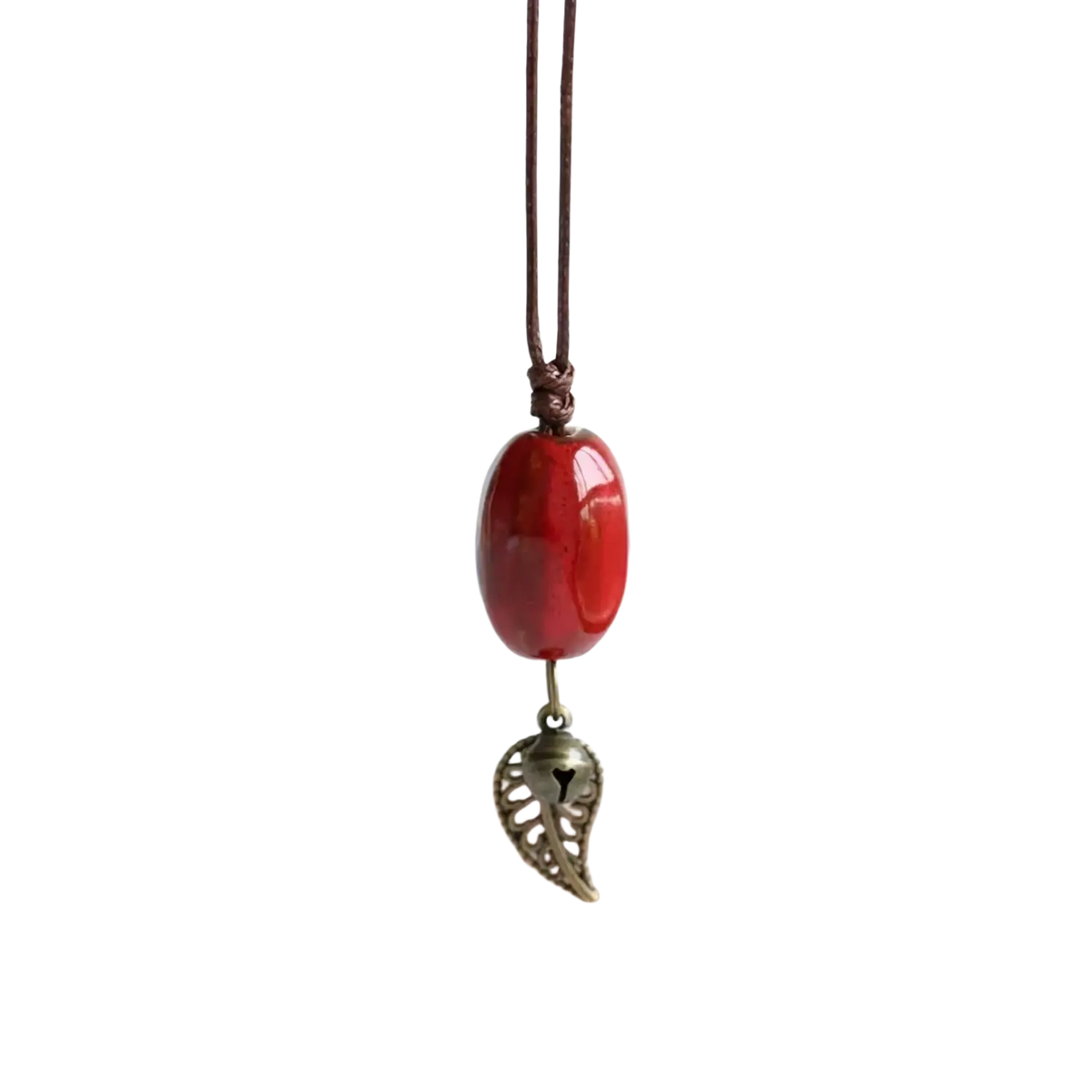 Vintage ceramic leaf pendant necklace for women featuring a glossy red oval bead with bronze leaf charm on brown cord