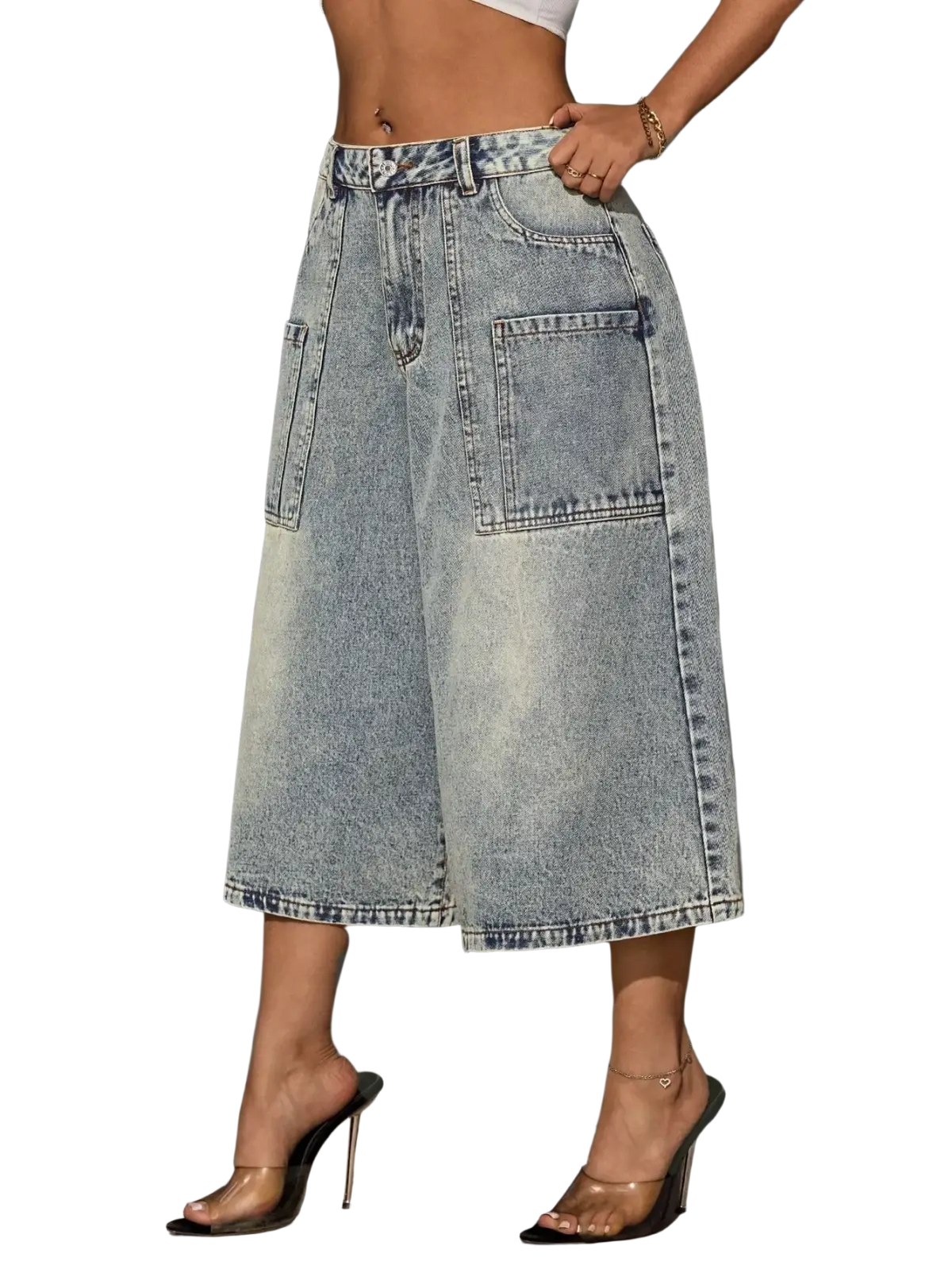 Vintage denim Bermuda shorts in light-wash denim with a high waist, wide-leg cut, and two large front pockets
