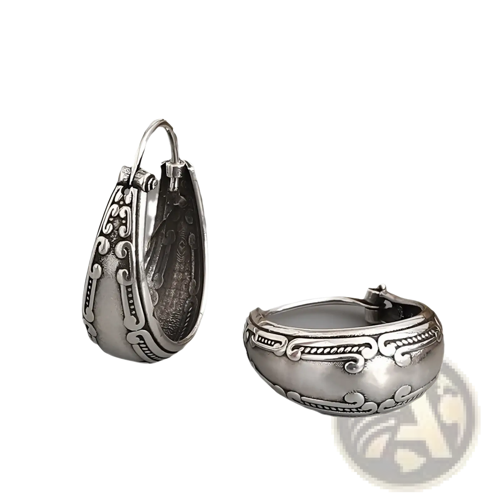 Vintage engraved silver alloy hoop earrings with intricate swirling patterns and polished metallic finish