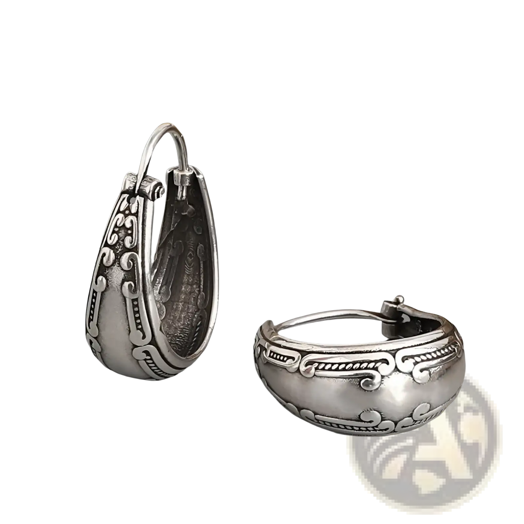 Vintage engraved silver alloy hoop earrings featuring intricate swirling patterns and a hammered texture