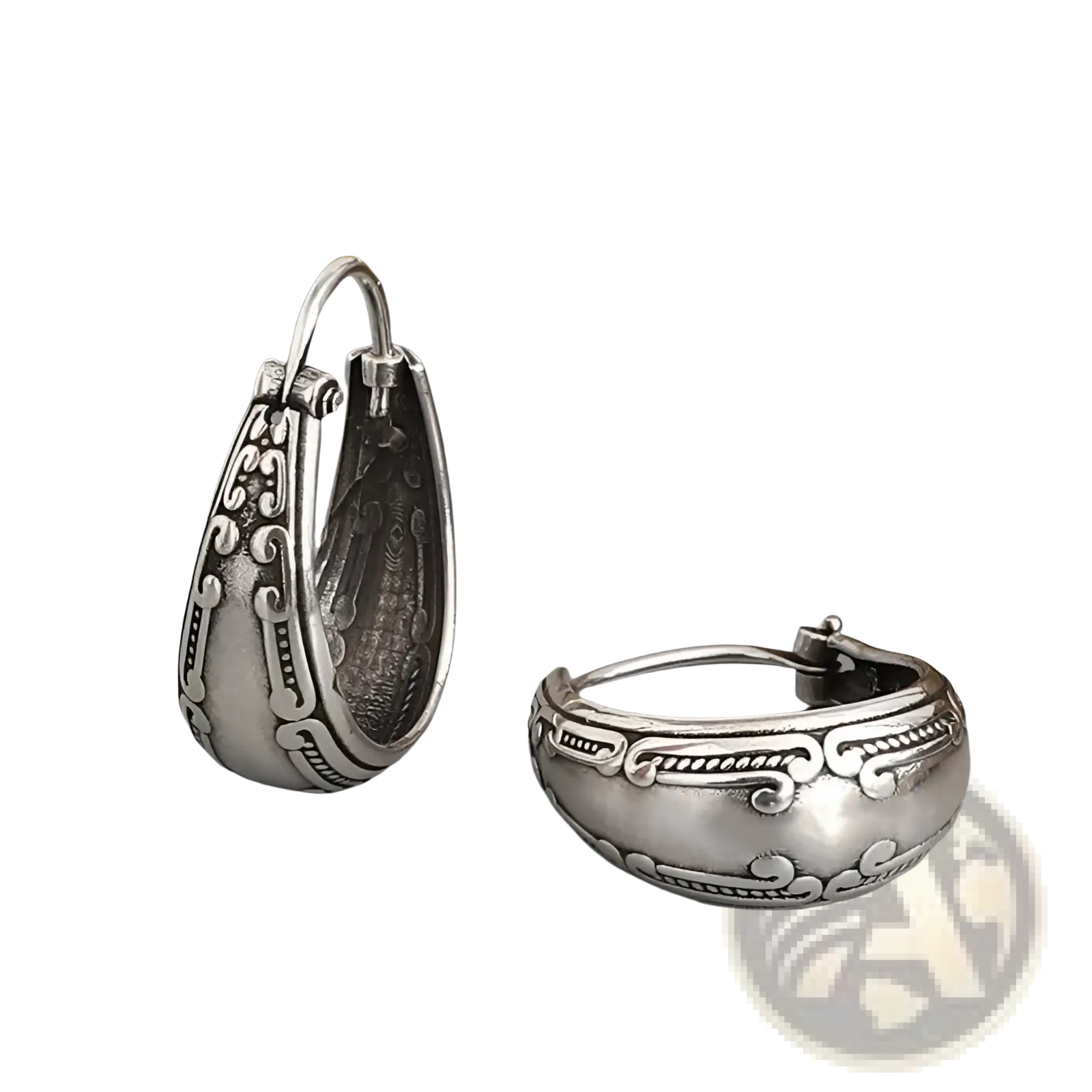 Vintage engraved silver alloy hoop earrings featuring intricate swirling patterns and a hammered texture